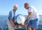 Deploying drifter buoy - Maggie